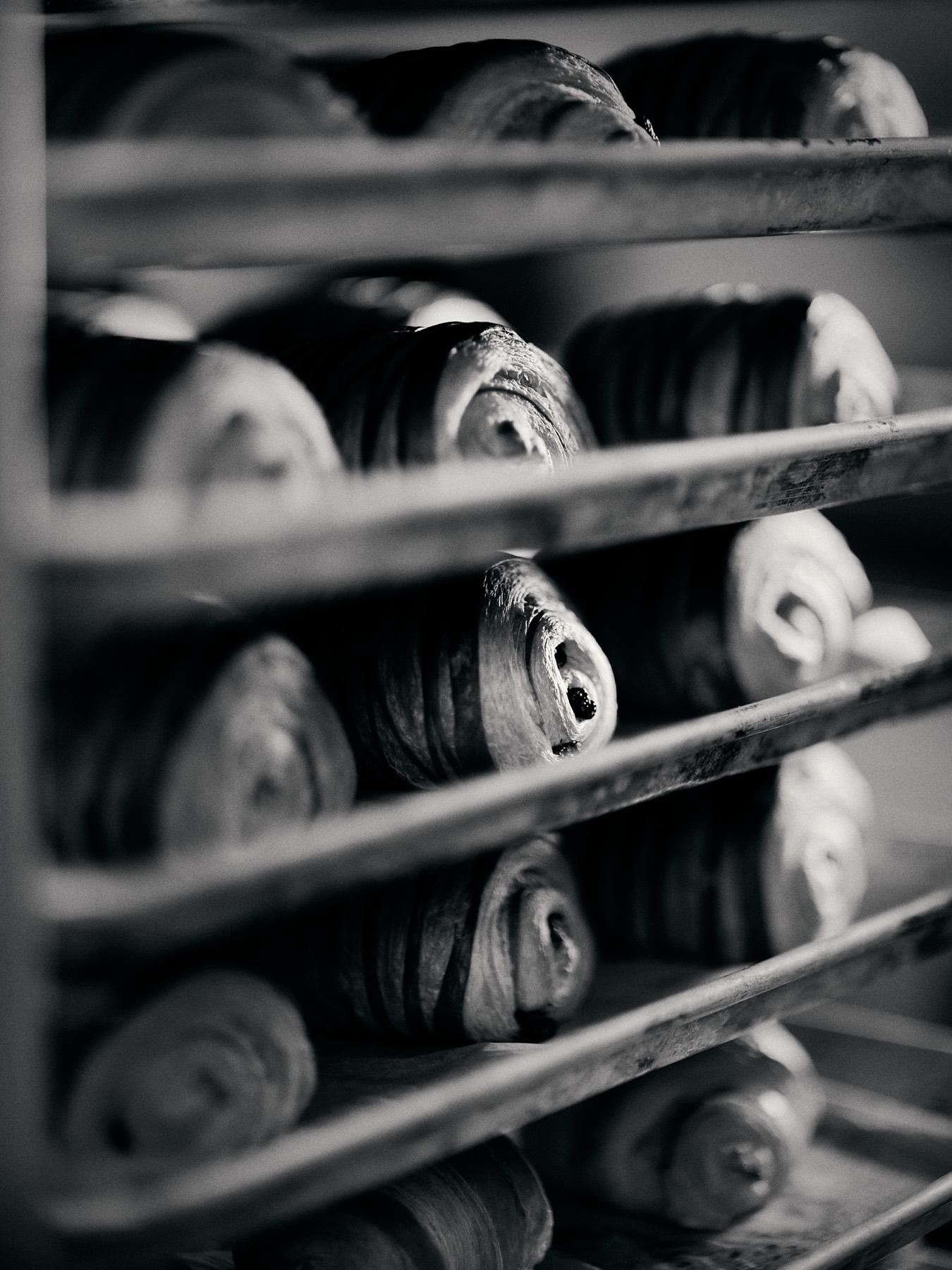 French pastries resting on a baking rack